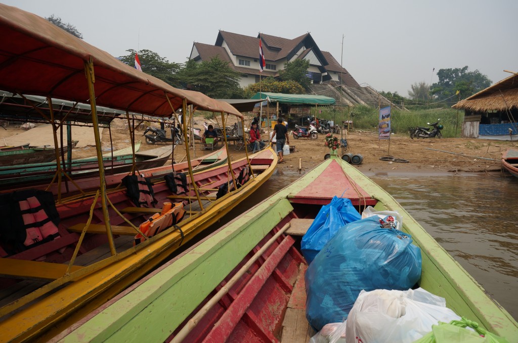 on-taxi-boat-leavng-thailand-across-mekong-river-drewmanity.com